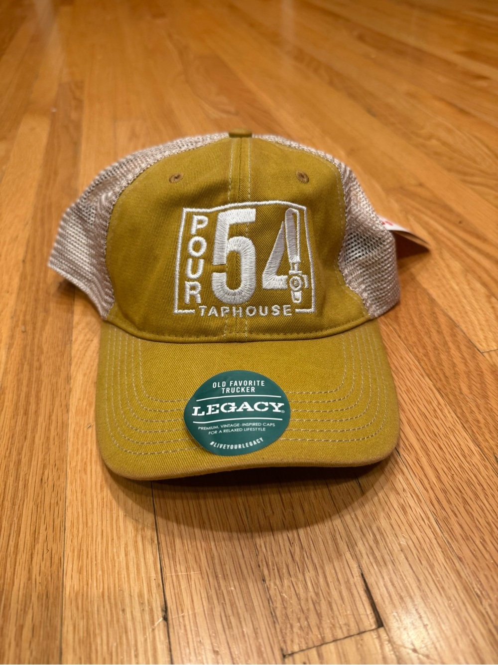 Legacy Olive Green and Beige Mesh Trucker Hat - Pour 54 Taphouse